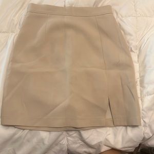 Short beige skirt